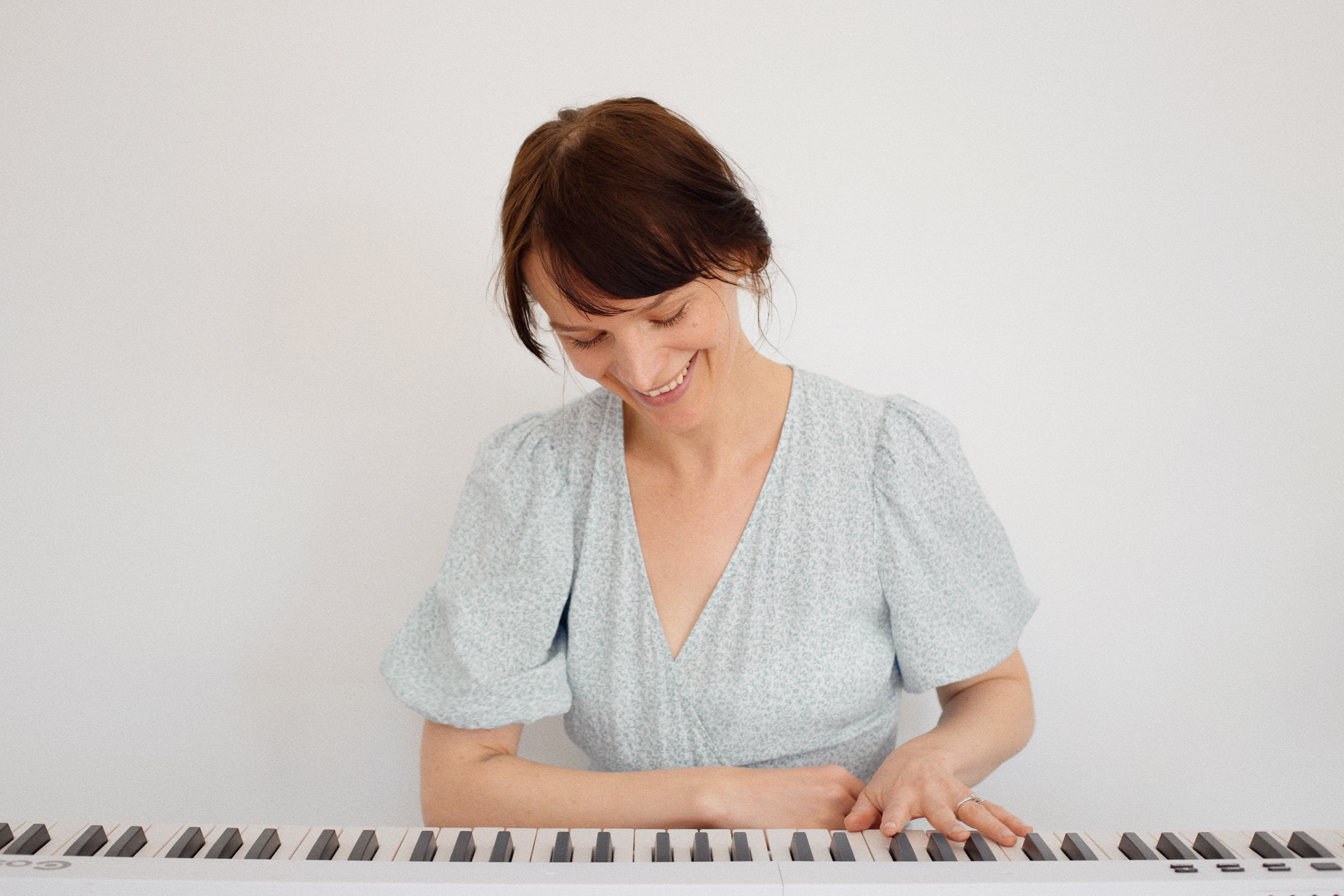 At the piano